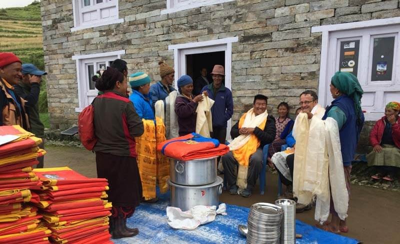 Donation at Khiraule Gompa